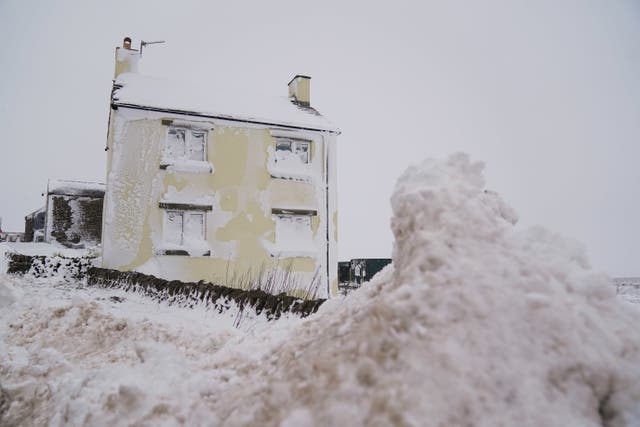 A house covered in snow