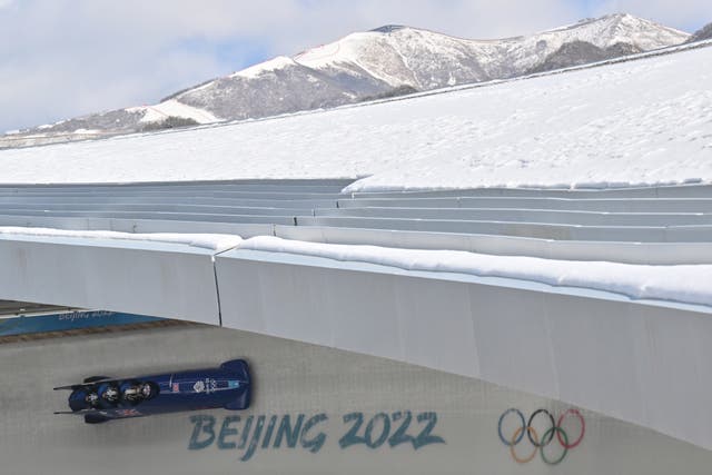 Great Britain’s Brad Hall and team-mates during the four-men bobsleigh men’s heat two
