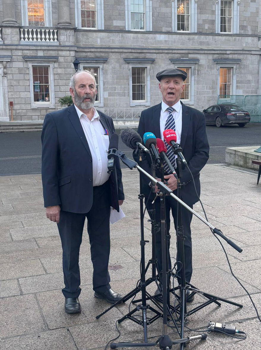Danny Healy-Rae and Michael Healy-Rae speak to the media outside Leinster House, Dublin, after it was confirmed that Michael will take up a junior role in the new government