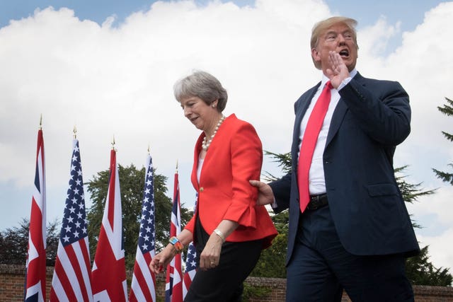 Donald Trump walks with Theresa May prior to a joint press conference at Chequers. (Stefan Rousseau/PA)