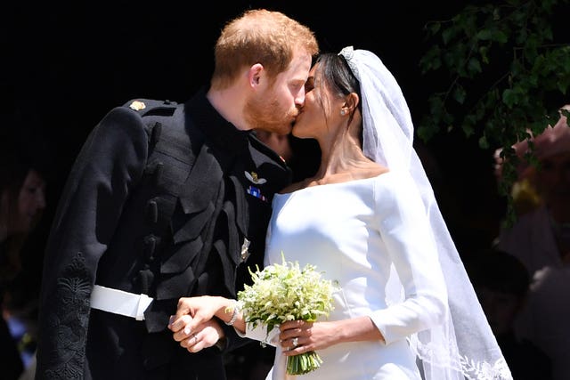 Harry and Meghan kiss after their wedding ceremony (Ben Stansall/PA)