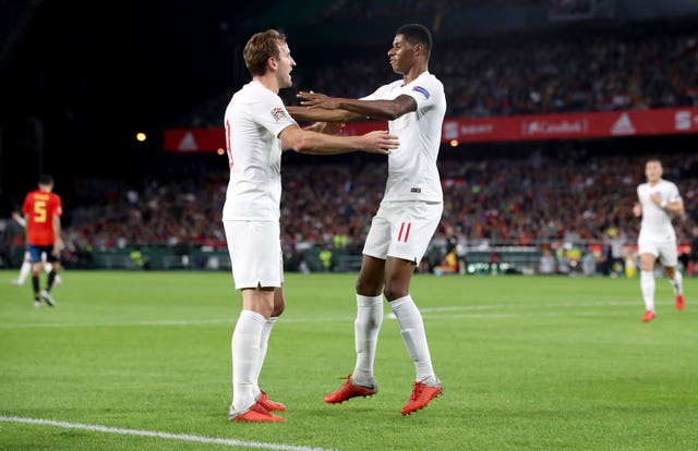 Marcus Rashford, right, could one day be on a par with Harry Kane, left, according to Ole Gunnar Solskjaer (Nick Potts/PA)
