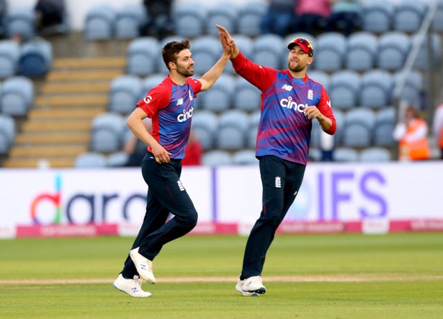 Mark Wood (left)  had two wickets in two balls 