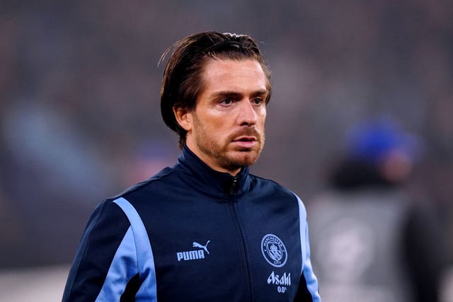 Jack Grealish looks on