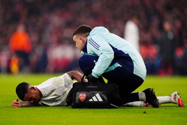 Arsenal’s Gabriel Jesus receives treatment from medical staff