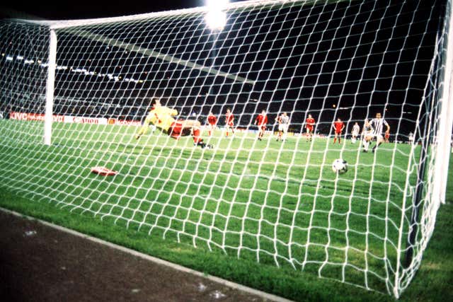 Michel Platini scores the winning goal for Juventus from the penalty spot
