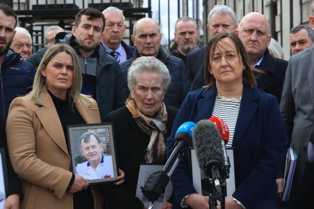Bridie Brown, the wife of Sean Brown, with his daughters Claire Loughran (left) and Siobhan Brown (front right) and his son Sean Brown (rear right) speaking to the media outside the Royal Courts of Justice, Belfast in March