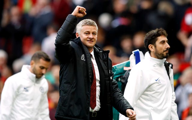 Manchester United manager Ole Gunnar Solskjaer celebrates after full-time 