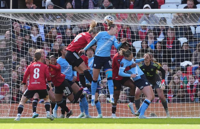 Vivianne Miedema, centre, scored her second goal