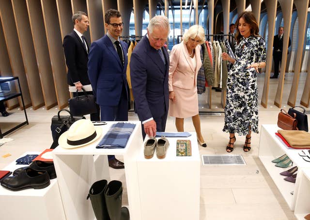 Charles and Camilla tour the new tech hub (Henry Nicholls/PA)