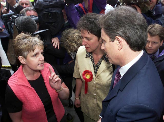 Tony Blair is confronted by Sharron Storer (PA Archive)