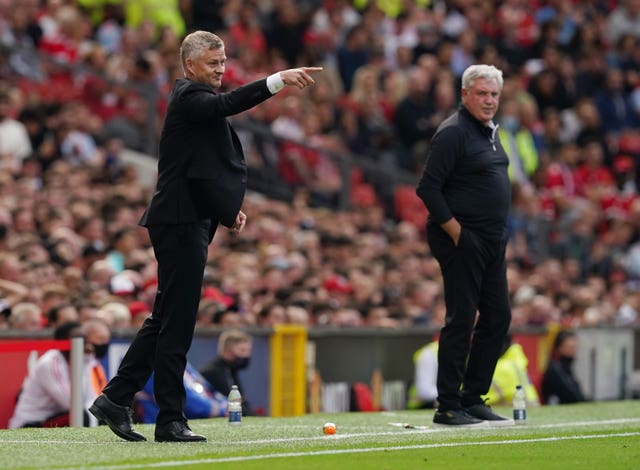 Ole Gunnar Solskjaer, foreground, and Steve Bruce