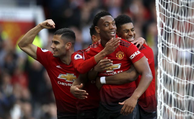 Manchester United’s Anthony Martial (centre) celebrates scoring his side’s second goal at Watford