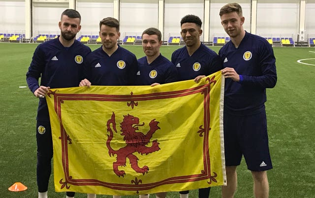 Marc McNulty (second left) is among five players looking for their first Scotland cap