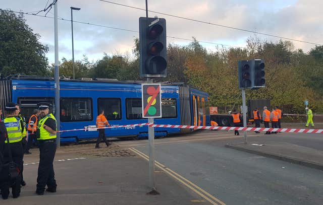 Emergency services at the scene in Staniforth Road Sheffield where a tram collided with a lorry on the Sheffield Supertram system