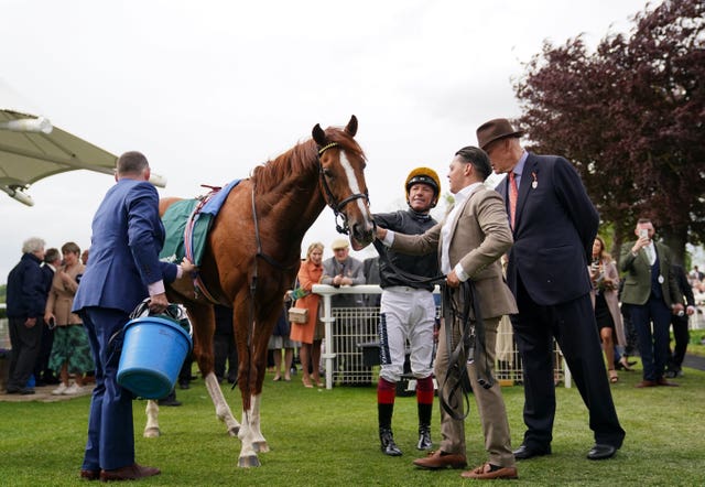 John Gosden looks on with pride