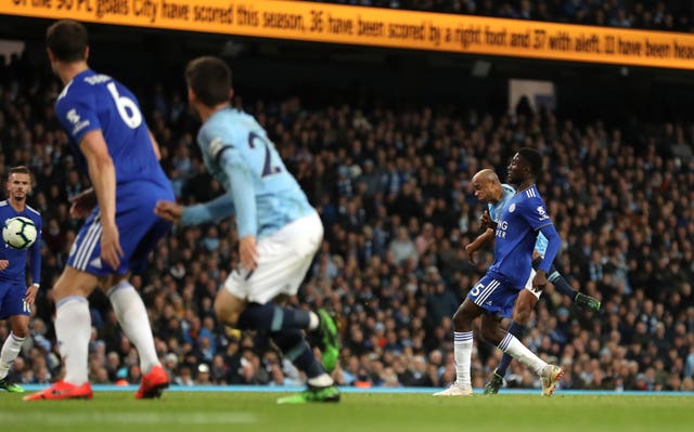 Vincent Kompany scores one of the goals of the season to secure a vital 1-0 win against Leicester in City's penultimate game 