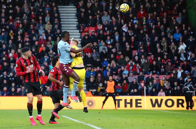 Mbwana Samatta, centre, heads home against Bournemouth