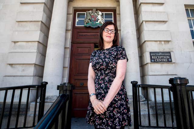 Siobhan McLaughlin, who is fighting a legal battle for access to benefits and allowances granted to widows, arrives at the Royal Courts of Justice in Belfast (Liam McBurney/PA)