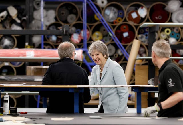 Theresa May defended her custom union plans as she visited Boss Design in Dudley (Darren Staples/PA)