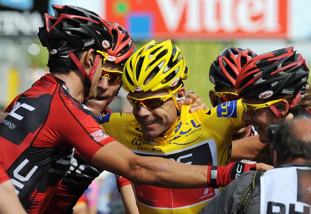 Australia's Cadel Evans, centre, won the 2011 Tour de France after Bradley Wiggins withdrew with injury