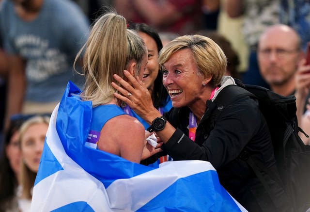 Eilish McColgan is congratulated by mum Liz after winning Commonwealth gold