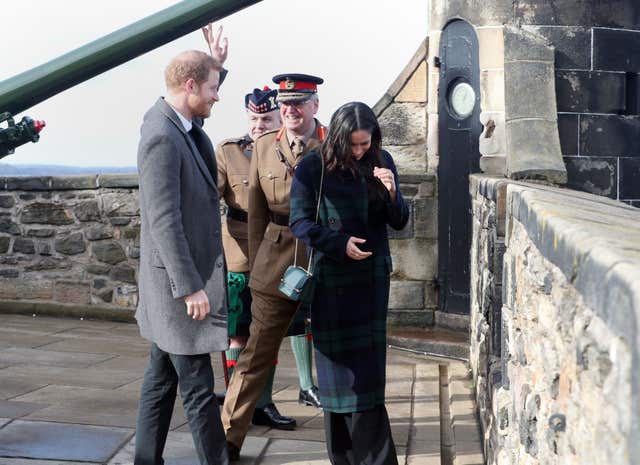 Prince Harry and Meghan Markle by the One o'clock gun at Edinburgh Castle (Jane Barlow/PA)