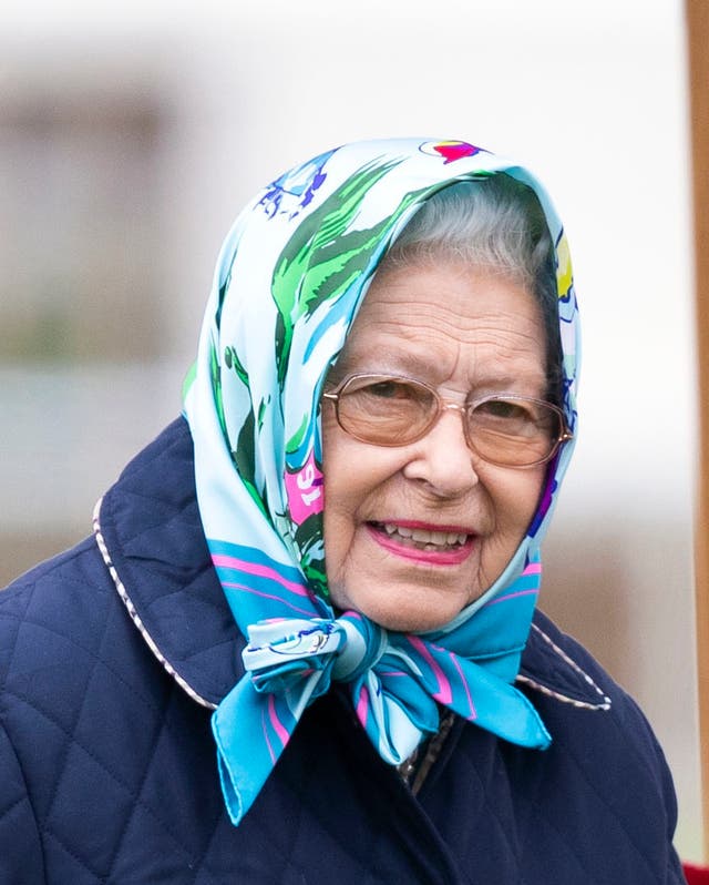 n wrapped up warm in a headscarf (Steve Parsons/PA)