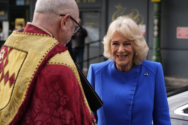 Queen Camilla arrives for a service of thanksgiving for Dame Jilly Cooper