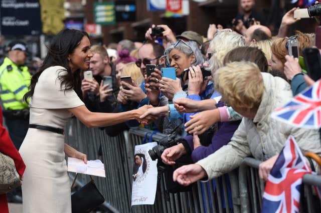 Meghan stopped to talk the crowds (Eddie Mulholland/Daily Telegraph/PA)