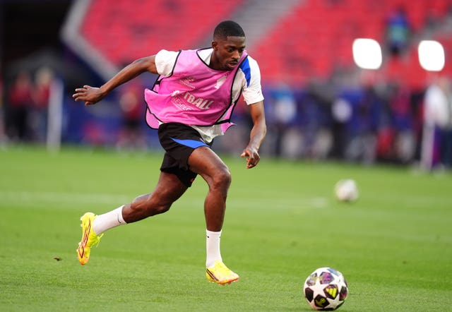 Paris St Germain’s Ousmane Dembele sprint after the ball during a training session