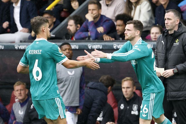 Liverpool’s Milos Kerkez exchanges a handshake with Andy Robertson after being substitutedsubstituted for Andrew Robertson