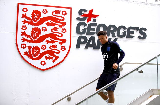 Jadon Sancho arrives for training at St George’s Park