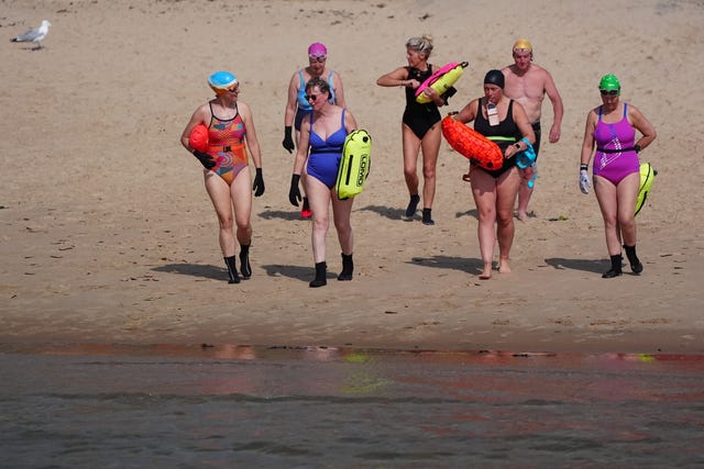 Swimmers at Cullercoats Bay, North Tyneside in the north east of England