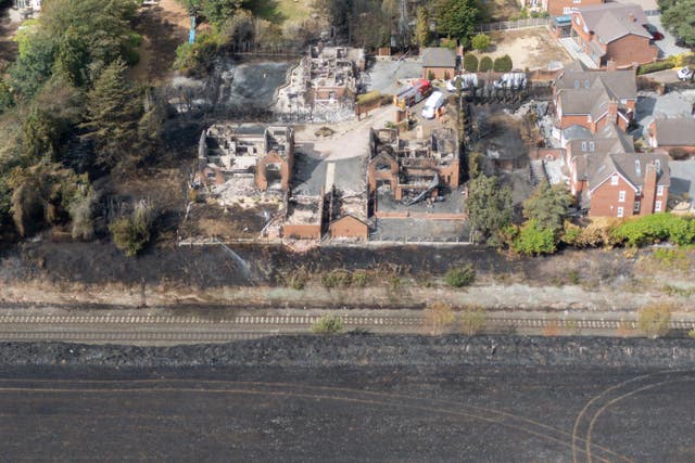 The burned out remains of houses following a blaze in Stourbridge
