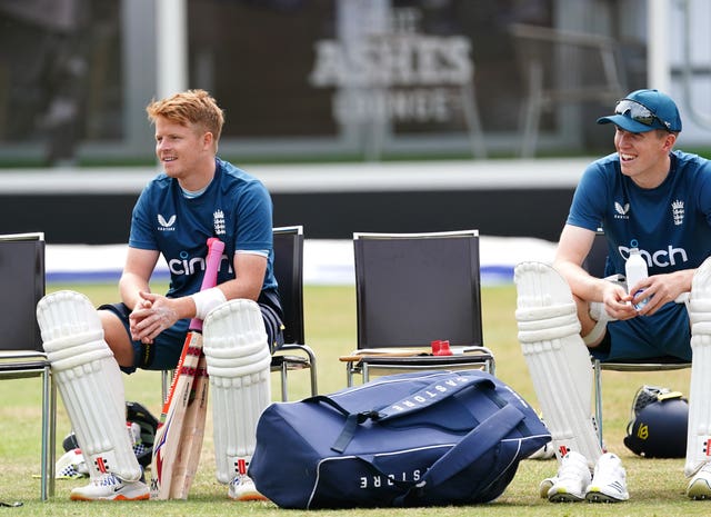 Ollie Pope (left) and Zak Crawley (right) take a seat at England training.