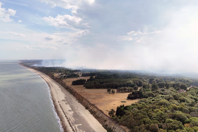 Smoke rises from a wildfire at Dunwich Heath, near Leiston