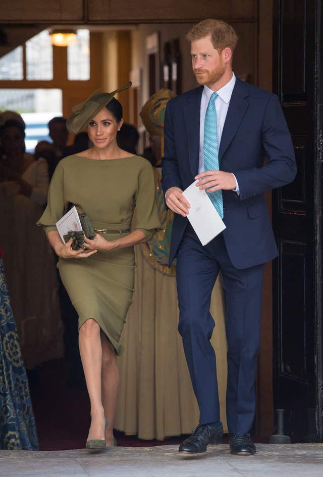 The Duke and Duchess of Sussex depart after attendingthe christening of Prince Louis at the Chapel Royal, St James's Palace, London.