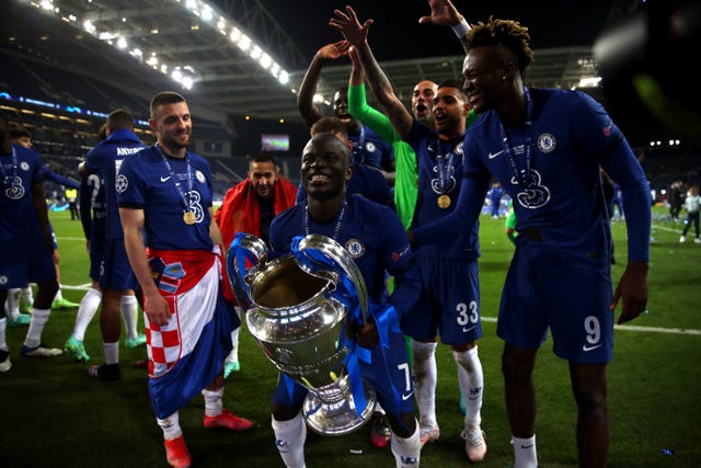 Man of the match N'Golo Kante lifts the trophy