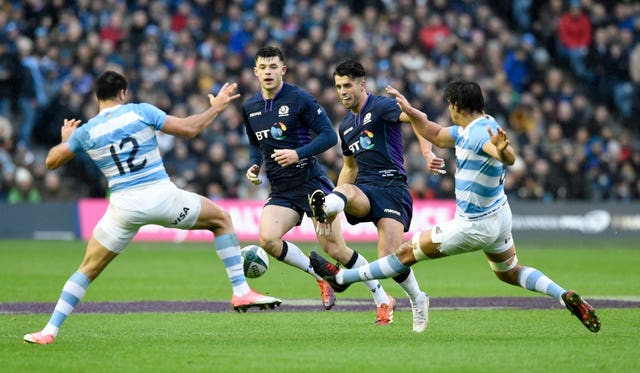 Adam Hastings had a kick charged down