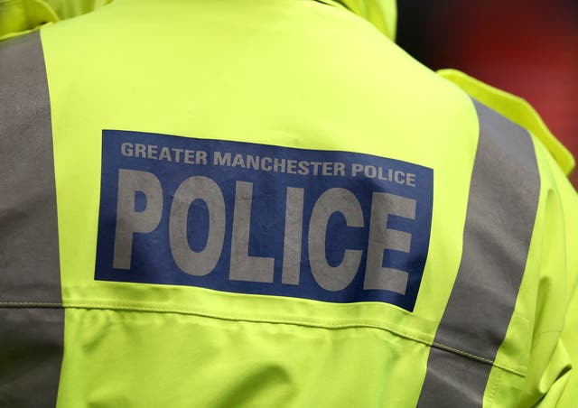 Greater Manchester Police took part in the raid (Peter Byrnbe/PA)