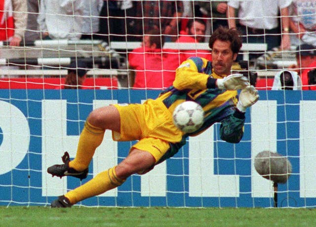 David Seaman saves a crucial penalty as England beat Spain in a shoot-out in the quarter-finals of Euro 96. 