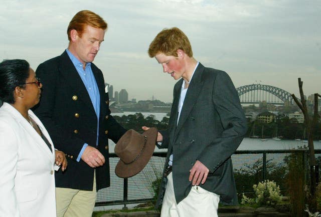 Mark Dyer with Prince Harry during Harry's gap year stay in Australia (Phil Noble/PA)
