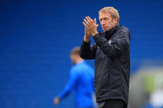 Brighton manager Graham Potter applauds the fans