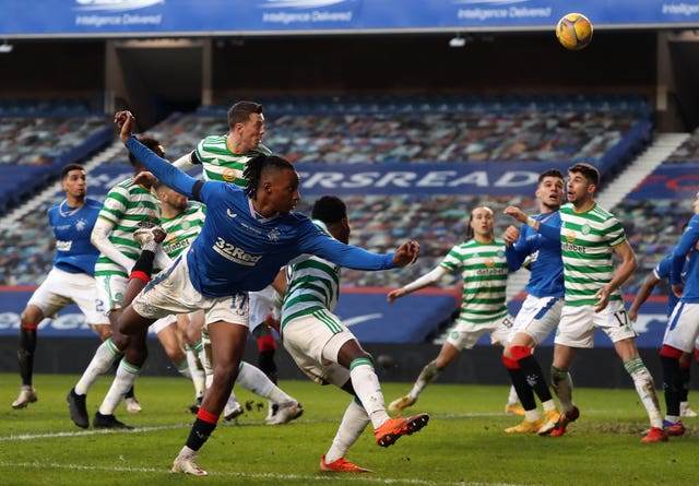 Celtic's Callum McGregor, centre top, scores the decisive own goal in Rangers' 1-0 win at Ibrox 