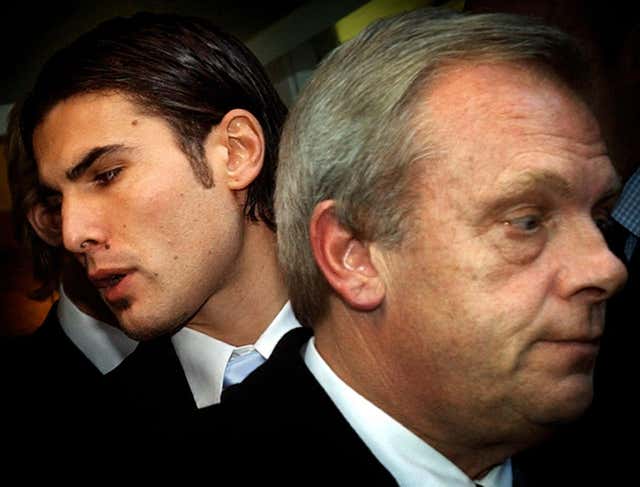 Adrian Mutu leaves the FA headquarters in London with Gordon Taylor in 2004. The Romania and former Chelsea star was given a seven-month ban following a disciplinary hearing regarding a failed drug test 