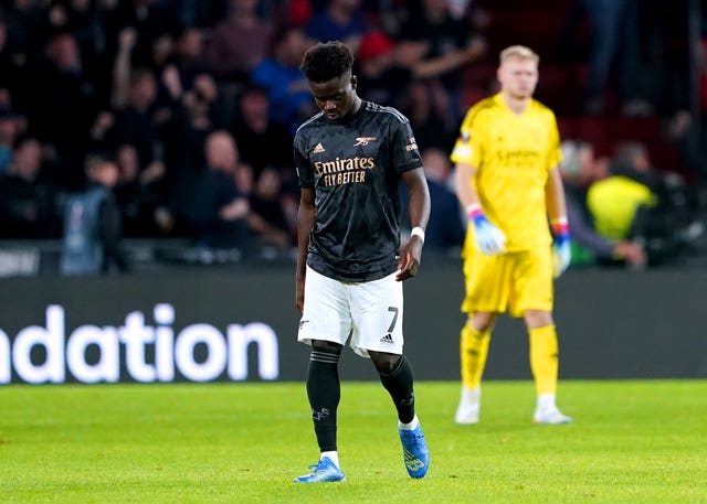 Bukayo Saka appears dejected