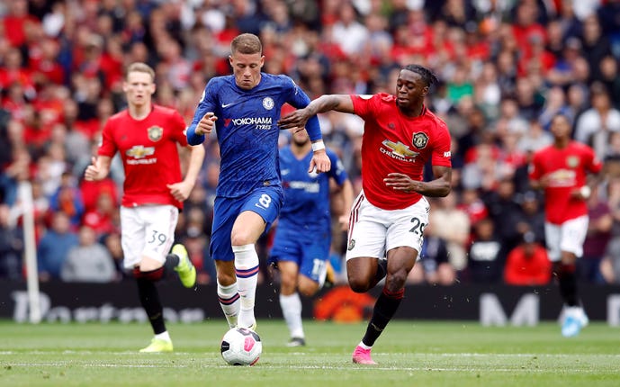 Aaron Wan-Bissaka, right, challenges Chelsea's Ross Barkley
