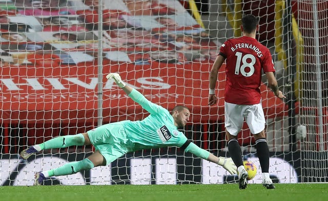 Sam Johnstone saved from Bruno Fernandes' penalty but had moved off his line too soon
