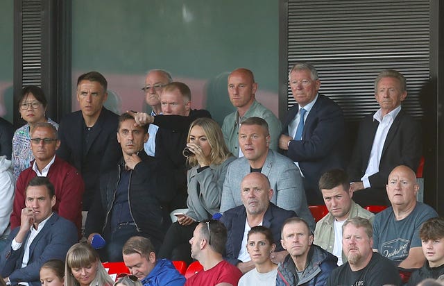 Phil Neville, fourth left,, Gary Neville, fifth left, Paul Scholes, centre left, and Nicky Butt, centre